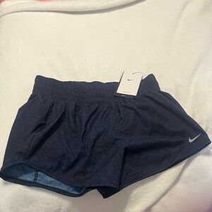 Nike Women's Dark Navy Athletic Shorts with Subtle Pattern